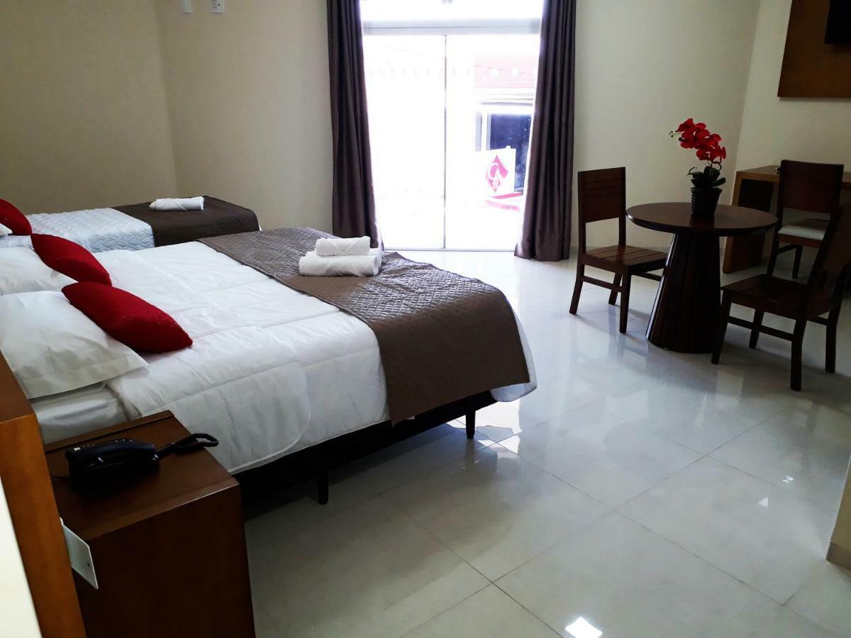 Campos Altos Palace Hotel Bagian luar foto